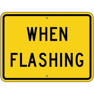 W16-13P When Flashing Sign